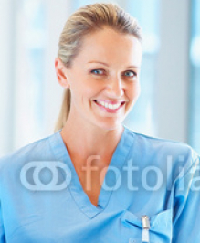 A_female_doctor_standing_with_a_confident_smile.jpg